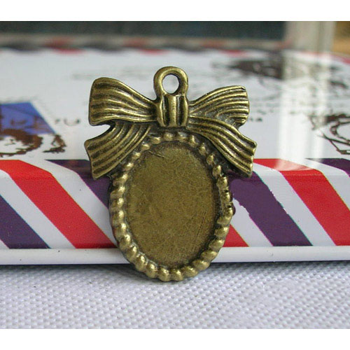 14x10MM Bronze Bowknot Oval Photo Jewelry Pendant Blank (sold in per package of 150pcs)