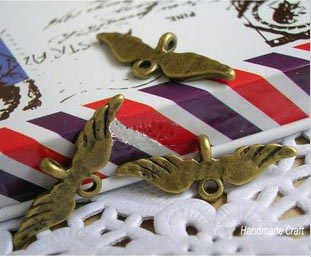 24X9MM Bronze Trinket Charms Angel'Wing (sold in per package of 300pcs)